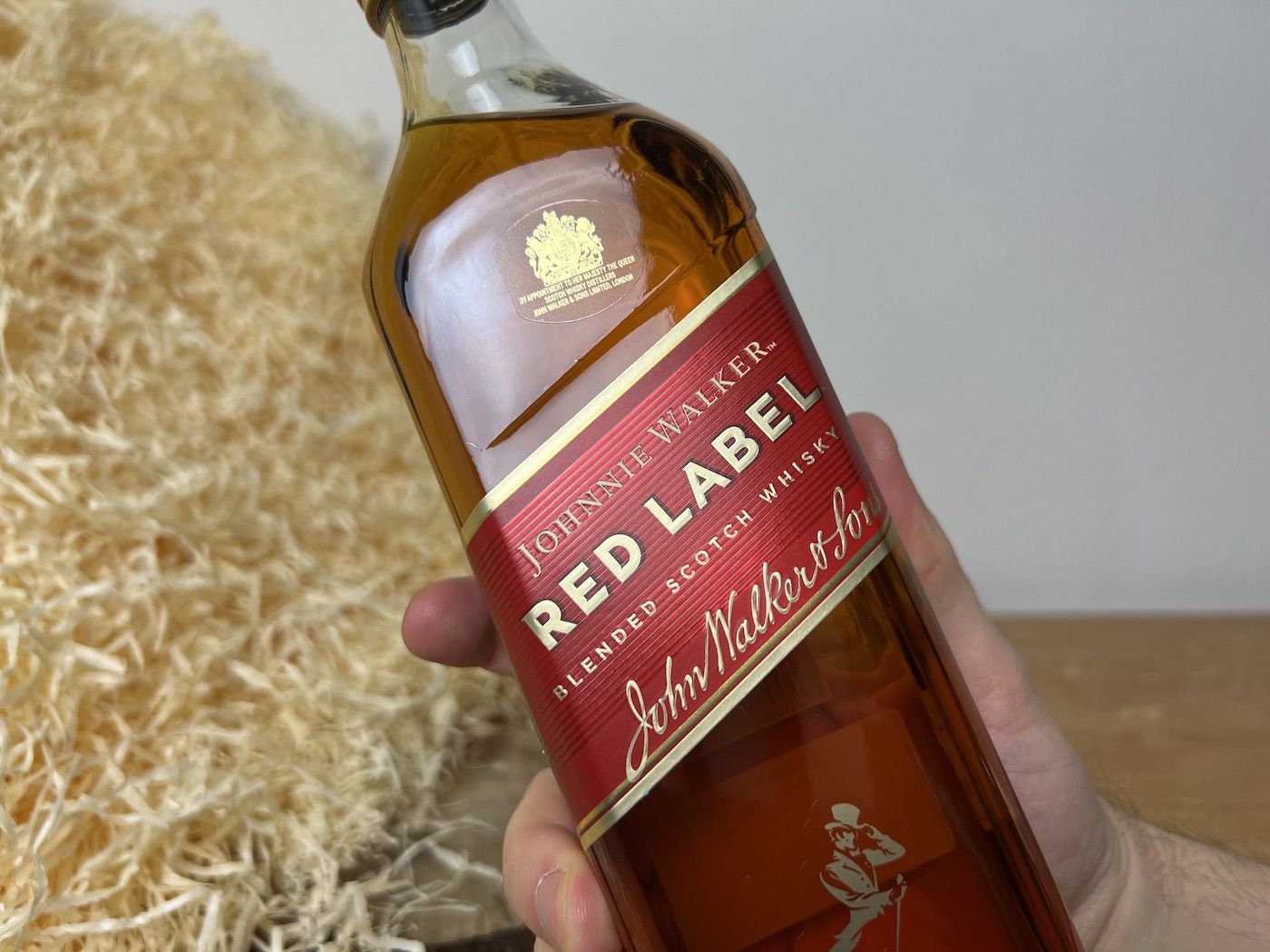 Johnnie Walker Red Label - detail na přední stranu láhve